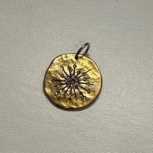 Waxing Poetic Gold and Silver Starburst Pendant